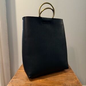 Anthropologie Street‎ Level cross body top handle tote bag in black and brass
